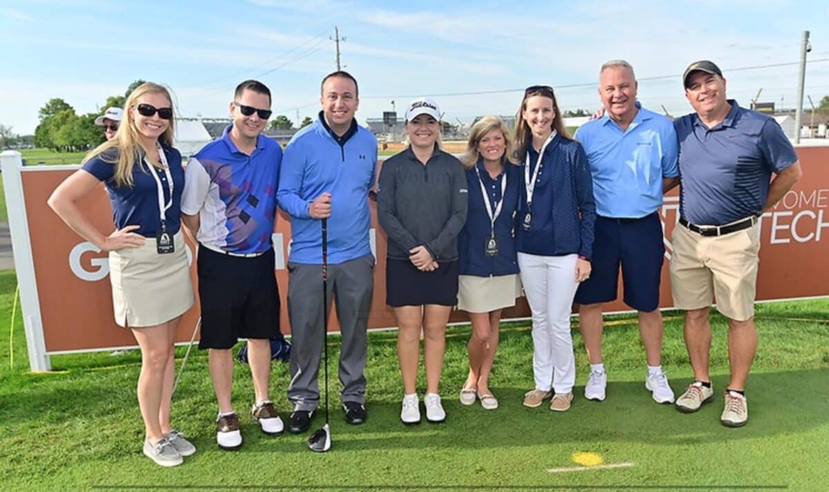 Picture of jason caudill, karen maginn (president of guggenheim life and annuity company, and guggenheims annuity marketing team at indy women in tech championship presented by guggenheim.